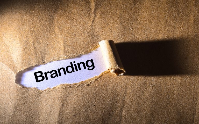 torn paper with word best branding